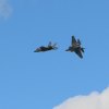 Two F-35s on approach to the NAS Lemoore runway.